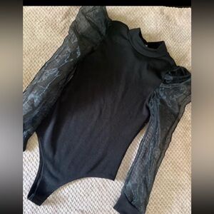 Puffer sleeve body suit.